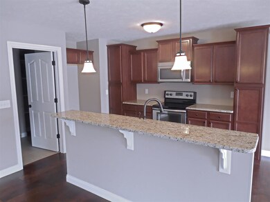 Upgrades including 3 cm granite counter tops, rais