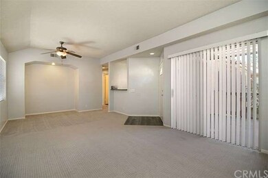 View from living room to patio and dining room