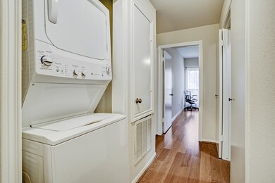 Utility area. The door leads to the A/C Unit.
