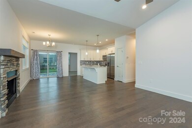 Open floor plan living/dining/kitchen.