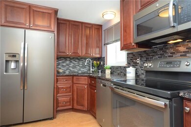 Recently remodeled kitchen with granite counters a