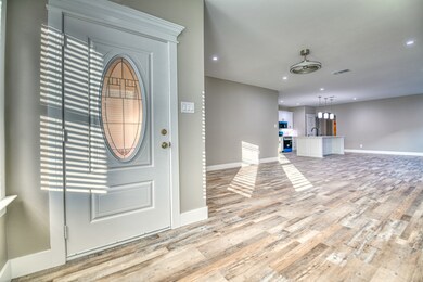 Foyer featuring recessed lighting and light wood-style floors