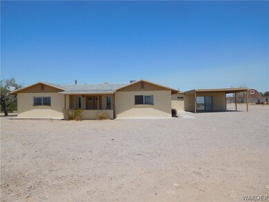 Front showing carport & CASIA