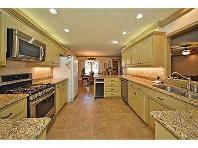 Kitchen. Granite counter tops with tumbled stone b