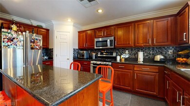 Kitchen with Custom Backsplash and Crown-Molding.