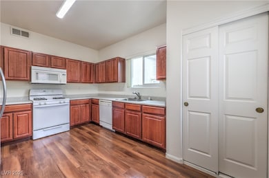 Kitchen featuring light countertops, visible vents