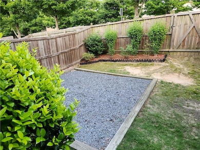 View of fenced backyard