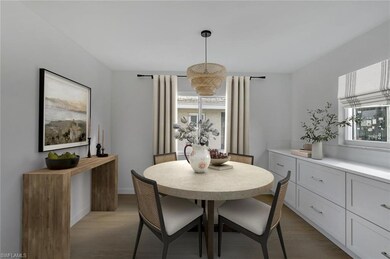 Staged-Dining space featuring light wood-style floors