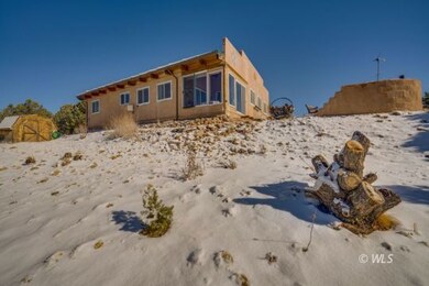 Back of the house with corner veranda