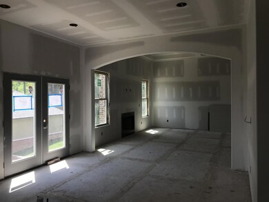 The living room from the kitchen. This is the actual house under construction