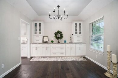 Built-in buffet with custom cabinets, granite, pul