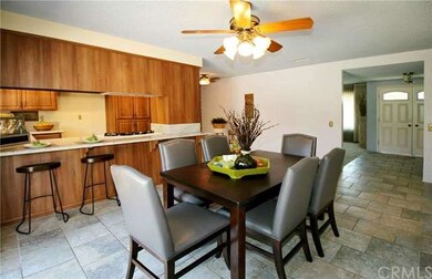 Alternate view of spacious dining area and kitchen