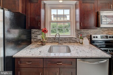 1303 E 36th St, Baltimore, MD 21218 - photo 3