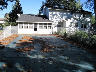 Exterior rear showing the in ground pool with cove