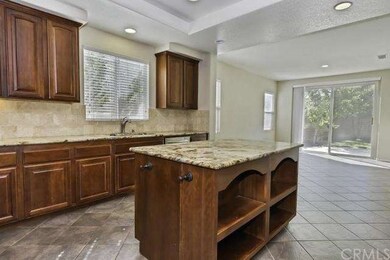 Gourmet Island Kitchen with granite counter tops, 