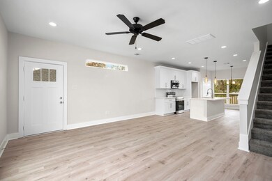 Living area on 1st floor. Open concept living.