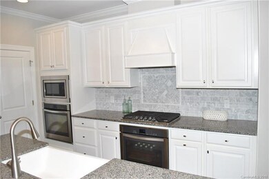 Double Ovens, Gas Cooktop and Farmhouse Sink