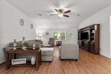 View of living room from kitchen area.