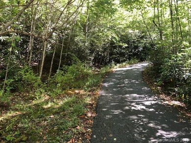Shared Paved road to private gravel drive