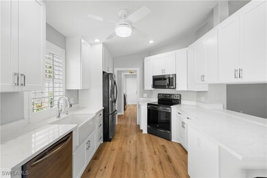 Kitchen featuring stainless steel appliances, ligh