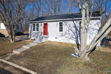 View of front of property featuring a front lawn