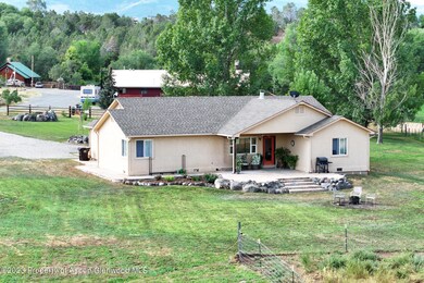 Creekside Home with Acreage For Sale in
