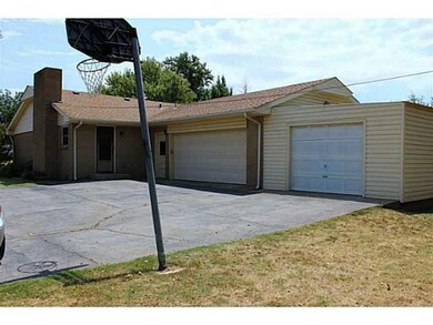 Exterior Front. BACK OF HOME VIEW OF GARAGES