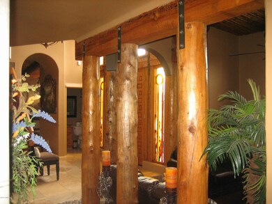 Vega Poles and Stain Glass in Entryway