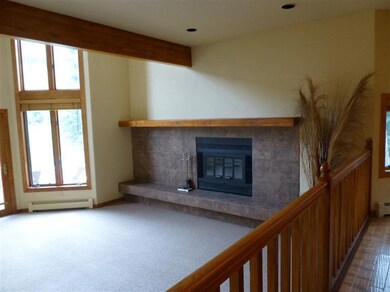 The wood-burning fireplace creates a war