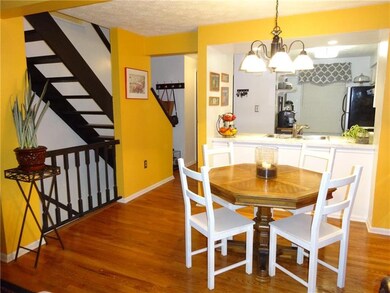 Open Dining Area with Oak Hardwood Floors views of
