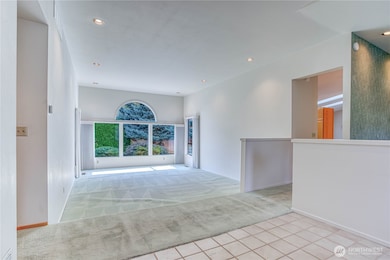 Living room with vaulted ceiling