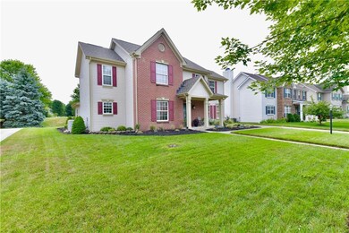 Well kept yard with lots of sidewalks and walking trails nearby