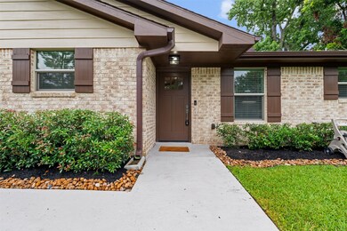 Inviting front entry with charming brick details.
