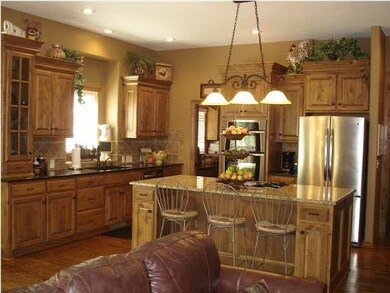 Kitchen offers a gas range top in the island, wind