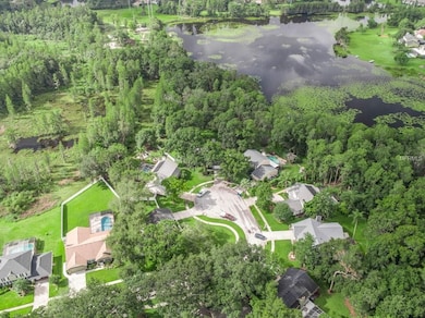 LAKE FRONT HOME SITTING ON 2.69 ACRES ON PRIVATE C