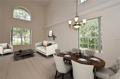 Virtually staged, open living and dining room.  Vi