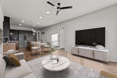 Living room featuring ceiling fan, recessed light