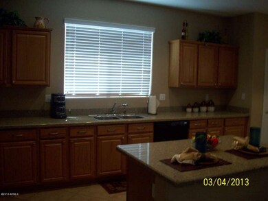 KITCHEN WITH GRANITE COUNTER TOP