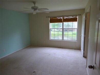Bedroom with carpet flooring