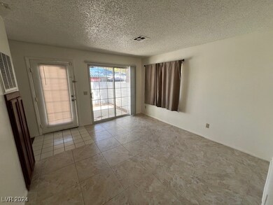 LIVING ROOM with Glass slider to patio