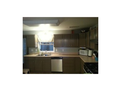 Kitchen with lots of storage and newer counter top