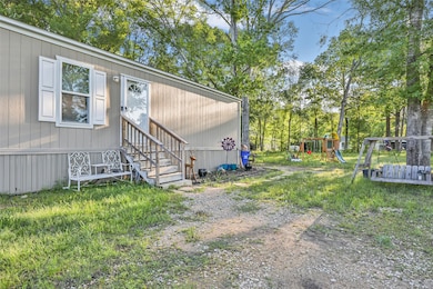 1027 County Road 3141 E, Cleveland, TX 77327 - photo 3