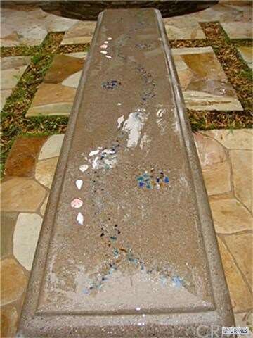 Meditation bench in front courtyard.