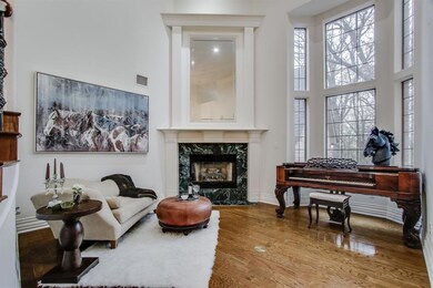 Formal living room has beautiful hardwoods!