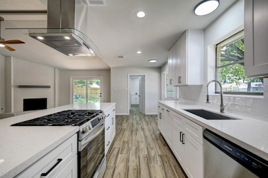 A standout culinary space, the kitchen features a