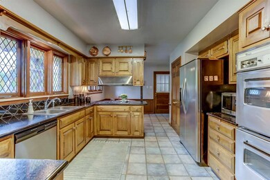 Wonderful eat-in kitchen comes equipped with a ful