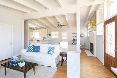 Open concept home with living room open to dining 