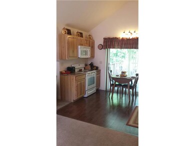 Kitchen. Notice the beautiful flooring and the sli