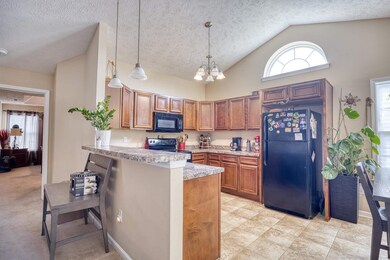 Kitchen featuring decorative light fixtures, light