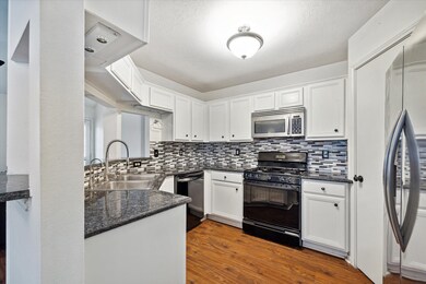 The recently remodeled kitchen has an abundance of cabinets!